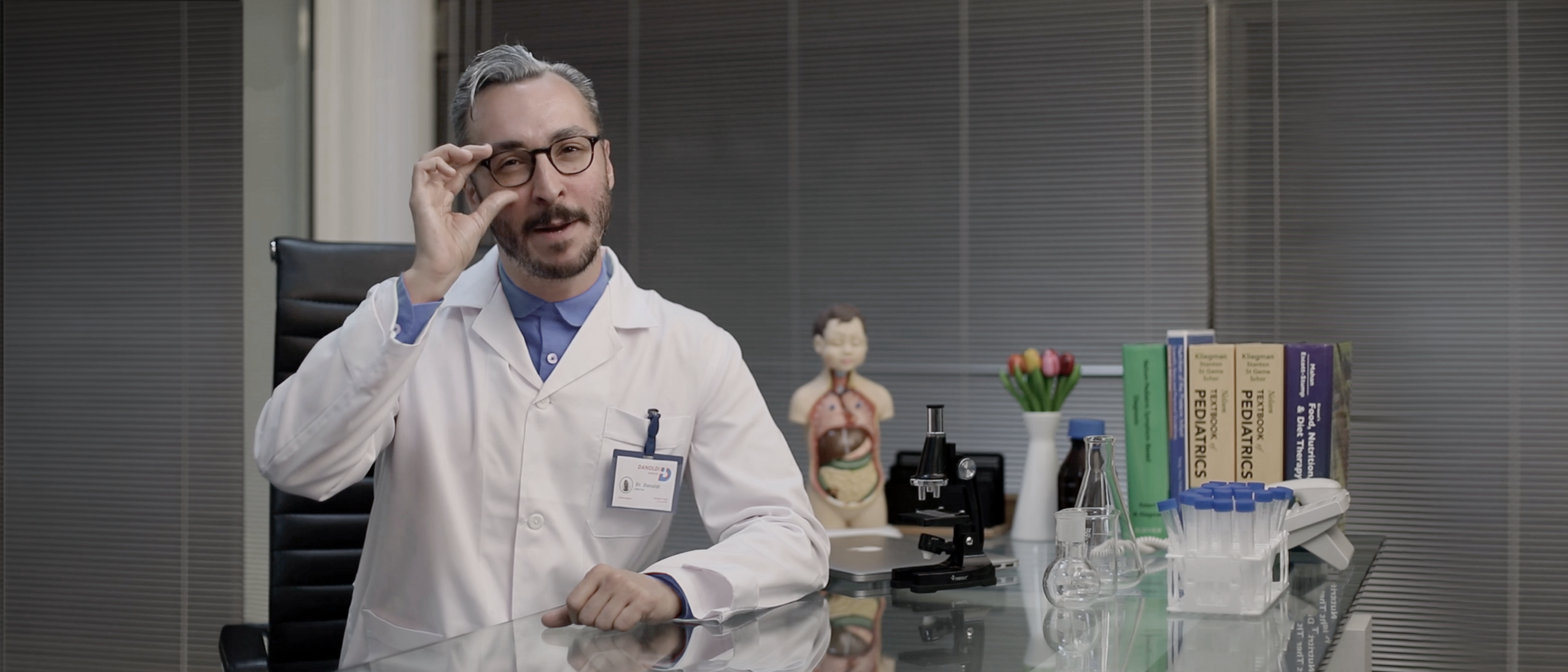 Doctor Danoldi introducing the secret-formula learning experience