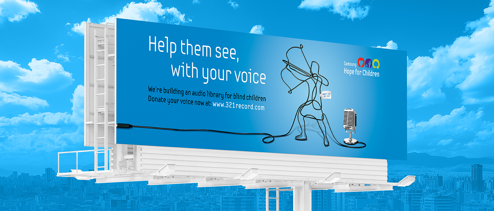 Samsung Giving Voices billboard above a city skyline